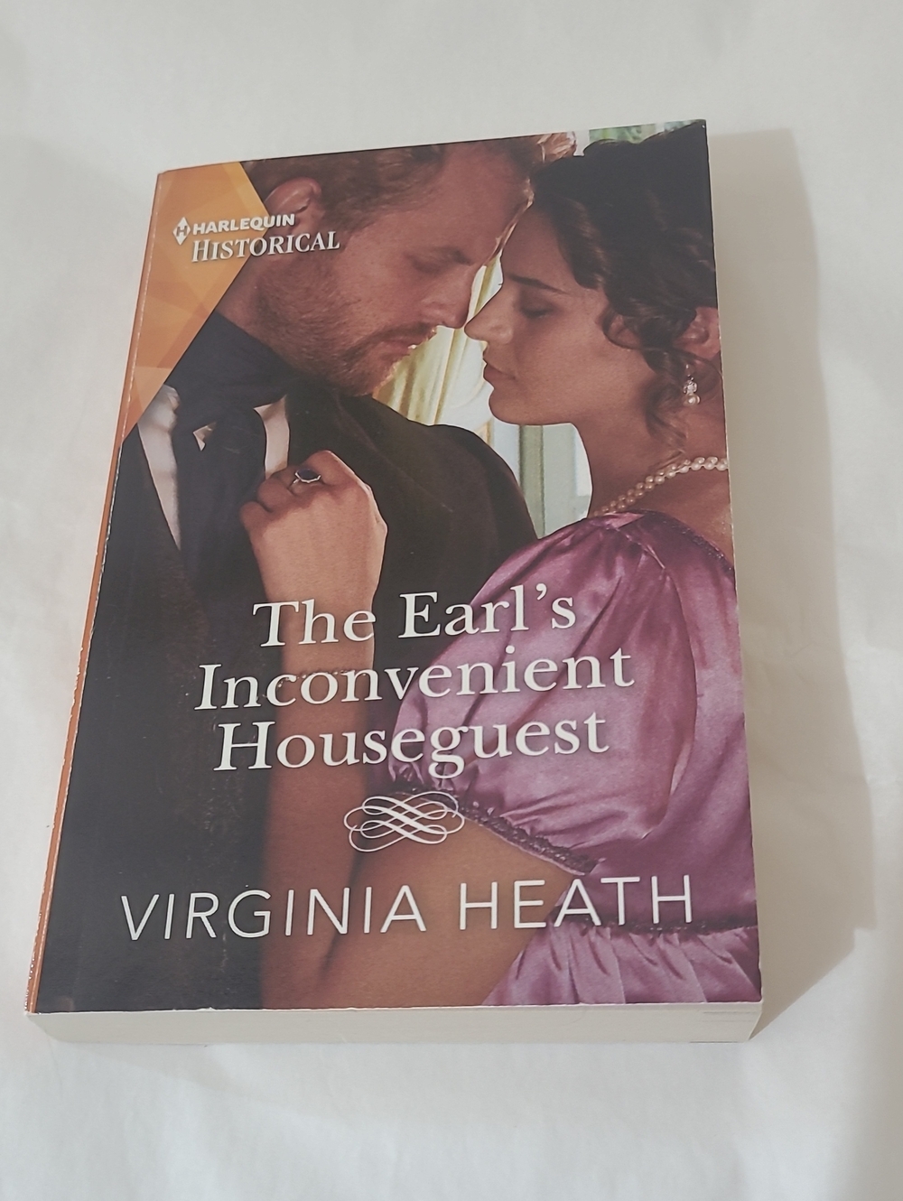 3/$5❤️The Earl's Inconvenient Houseguest by Virginia Heath - Purple Cover